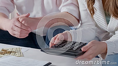 Couple counting salary money, planning budget, low incomes of average family Stock Photo
