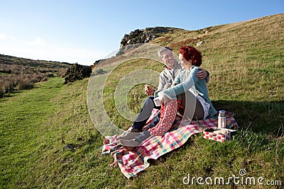 Couple on country picnic Stock Photo