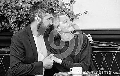 Couple cuddling cafe terrace. Couple in love sit cafe terrace enjoy coffee. Pleasant family weekend. Married lovely Stock Photo