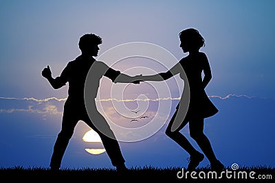 Couple dancing boogie woogie at sunset Stock Photo