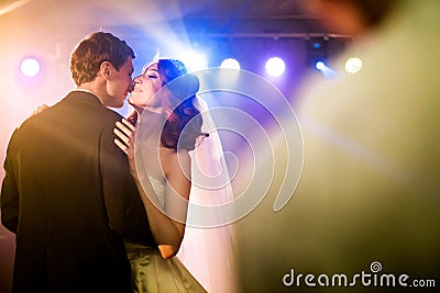 Couple is dancing on the bright dance Stock Photo