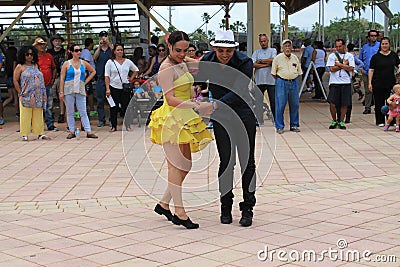 Couple dancing at a festival in Miami Editorial Stock Photo