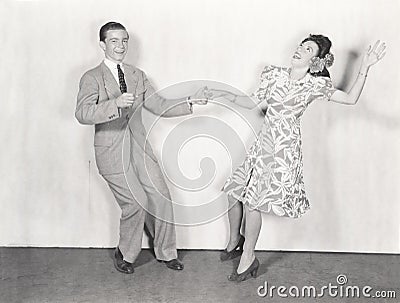 Couple dancing the jitterbug Stock Photo