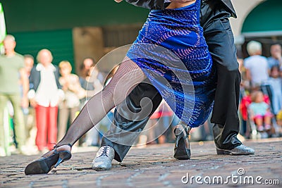 Couple dancing tango in the street Stock Photo