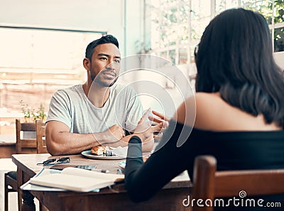 Couple, dating and cafe date while serious boyfriend and girlfriend with good communication over lunch. Man and woman Stock Photo