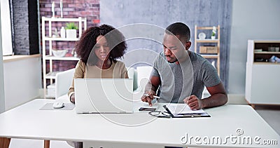 Couple Doing Taxes And Family Budget Stock Photo