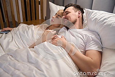 Couple is dozing in the honeymoon suite Stock Photo