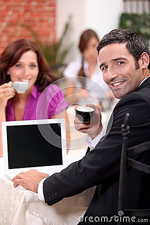 Couple drinking expresso in a cafe Stock Photo