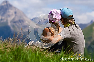 Couple enjoing a mountains view Stock Photo