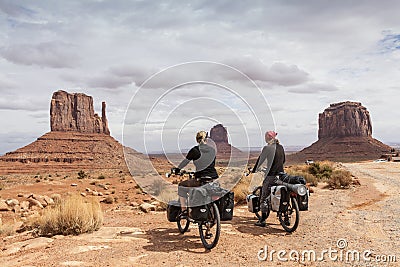 A couple enjoying the view of the Monument Valley Editorial Stock Photo