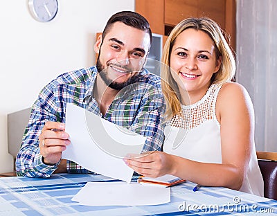 Couple filling forms for bank Stock Photo