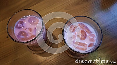 A couple glass of red velvet ice as a snacking time in the evening Stock Photo