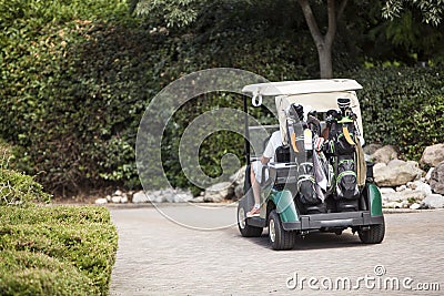 Couple golf players on cart golf Editorial Stock Photo