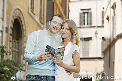 Couple With Guidebook In Rome Stock Photo