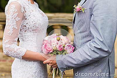 Couple hands on wedding Stock Photo