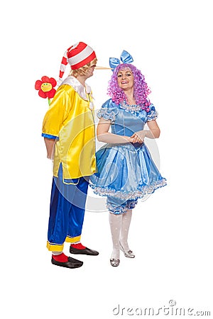 Couple of happy clowns in Pinocchio and Malvina suits Stock Photo