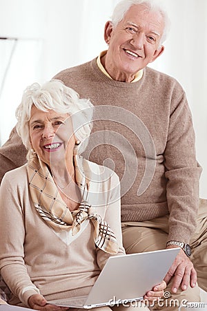 Elder people uses computer Stock Photo
