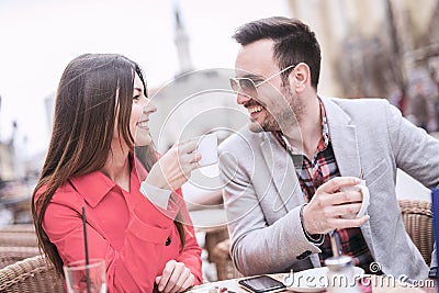 Couple having a cup of coffee on a date Stock Photo