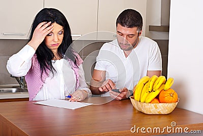Couple having difficult to calculate expenses Stock Photo