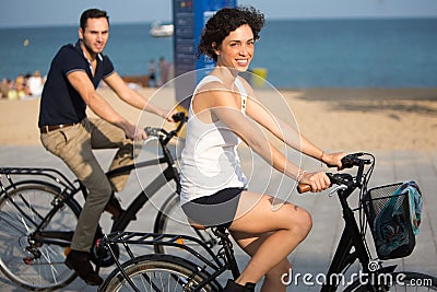 Couple having fon on bikes Stock Photo