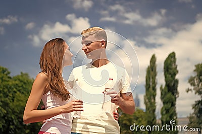 Couple hold water bottles. Water balance concept. Signs you definitely need pay attention body hydration. Sport and Stock Photo