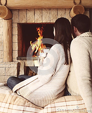 Couple holding cups with hot chocolate with marshmallows Stock Photo