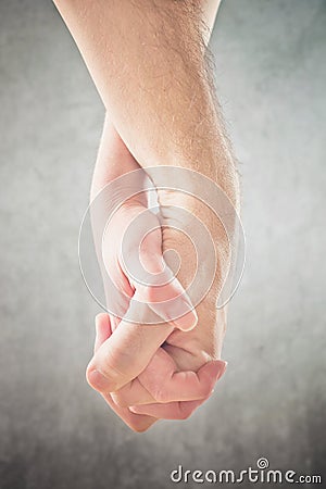 Couple holding hands Stock Photo