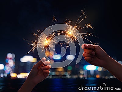 Couple holding a sparklers Stock Photo