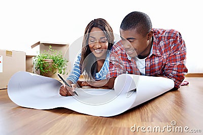 Couple with home plans Stock Photo