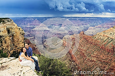 A couple on a honeymoon road trip at Grand Canyon Stock Photo