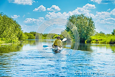 Couple at kayak trip on blue river Stock Photo