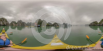 Couple kayaking Ha Long Bay, Vietnam Stock Photo