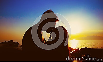 Couple kissing on the beach Stock Photo