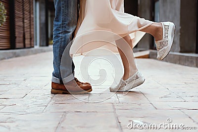 The couple kissing, Couples foots stay at the street Stock Photo