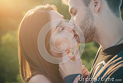 Couple kissing. Touching face ecstasy and pleasure. Making kiss to young lover. Sensual couple make kiss. Young lovers Stock Photo