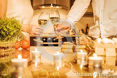 Couple on the kitchen cooking together. Stock Photo
