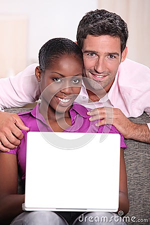 Couple with a laptop. Stock Photo