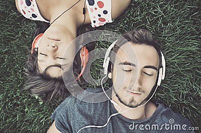 Couple listening to music Stock Photo