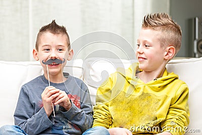 Couple of little brothers making funny faces Stock Photo