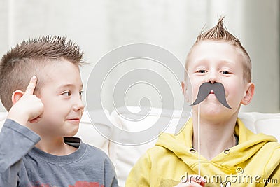 Couple of little brothers making funny faces Stock Photo