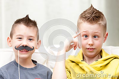 Couple of little brothers making funny faces Stock Photo