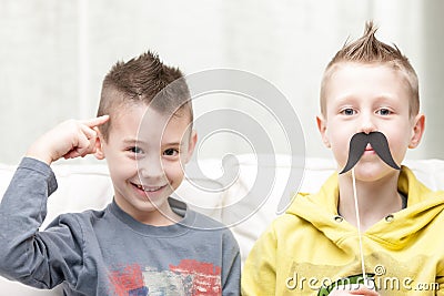 Couple of little brothers making funny faces Stock Photo