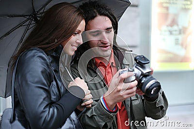 Couple looking digital photos Stock Photo