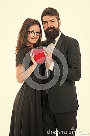 Couple in love. Family couple. Formal couple with red heart. Love romance. Couple on love date. Bearded man in tuxedo Stock Photo