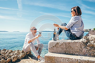 Couple in love have romantic date in blue sea lagune Stock Photo