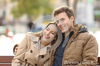 Couple in love hugging in an urban park Stock Photo