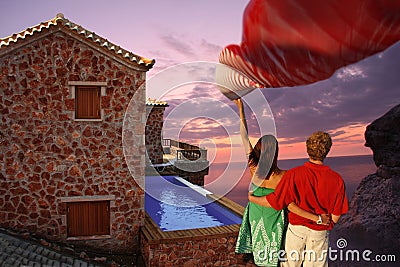 couple in love with luxury villa with swimming po Stock Photo