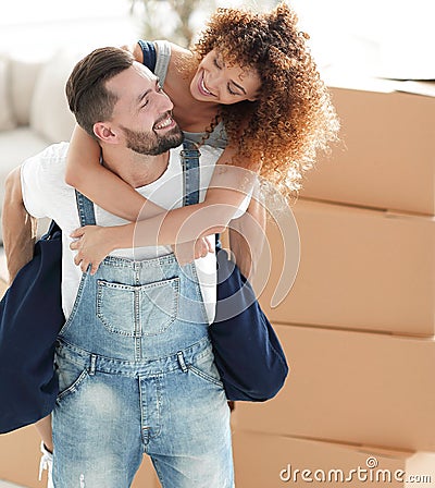 Portrait of a couple in love in a new empty apartment. Stock Photo