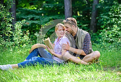 Couple in love spend leisure reading book. Couple soulmates at romantic date. Pleasant weekend. Romantic couple students Stock Photo
