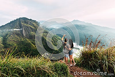 A couple in love takes a selfie. Man and woman holding hands. The couple travels around Asia. Travel to Sri Lanka. Honeymoon trip Stock Photo